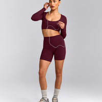 SoftMotion™ Scoop Neck Long Sleeve Crop Top with Built in Bra Shelf with Gray Logo | Cherry Lacquer Purple