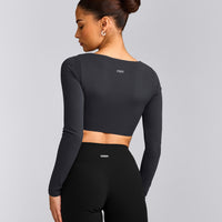 SoftMotion™ Scoop Neck Long Sleeve Crop Top with Built in Bra Shelf with Grey Logo | Coal