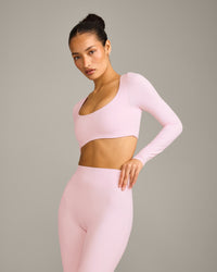 SoftMotion™ Scoop Neck Long Sleeve Crop Top with Built in Bra Shelf with Grey Logo | Soft Girl Pink