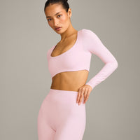 SoftMotion™ Scoop Neck Long Sleeve Crop Top with Built in Bra Shelf with Grey Logo | Soft Girl Pink