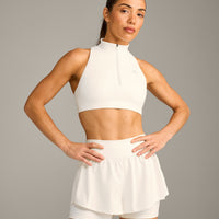 EasyLift™ Zip High Neck Sports Bra with Grey Logo | Marshmallow White