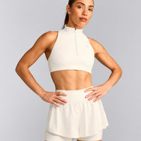 EasyLift™ Zip High Neck Sports Bra with Gray Logo | Marshmallow White