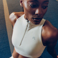 EasyLift™ Zip High Neck Sports Bra with Gray Logo | Marshmallow White