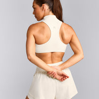 EasyLift™ Zip High Neck Sports Bra with Gray Logo | Marshmallow White