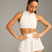 EasyLift™ Zip High Neck Sports Bra with Grey Logo | Marshmallow White