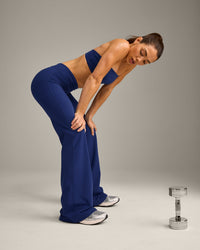 UnifiedMove Wrap Flared Bottoms with Reflective Logo | Varsity Blue