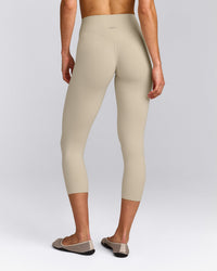 SoftMotion™ 3/4 Length Leggings with Grey Logo | Oatmeal