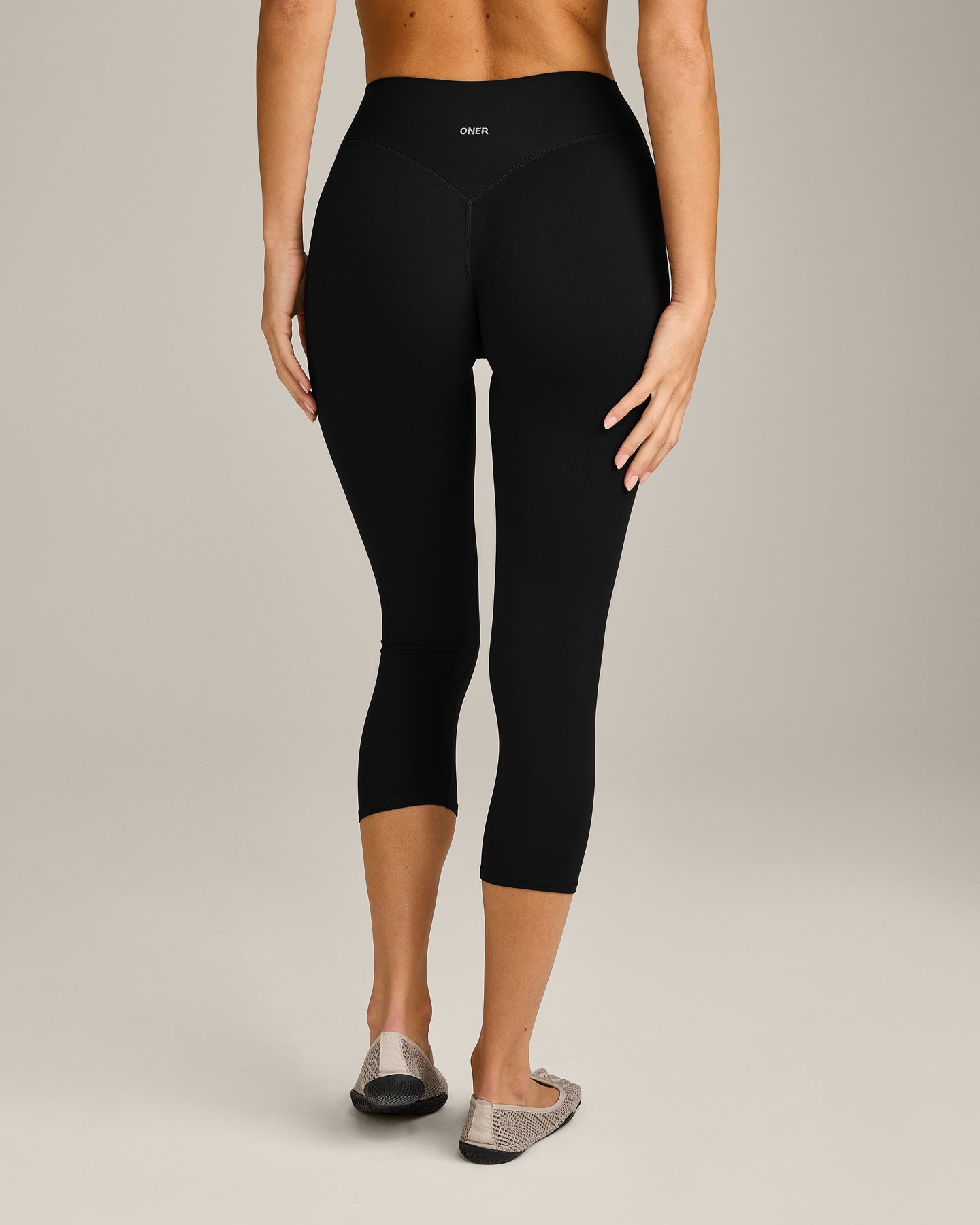 SoftMotion™ 3/4 Length Leggings with Grey Logo | Black