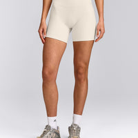 SoftMotion™ Double Layer High Waisted Shorts 6" with Gray Logo | Marshmallow White