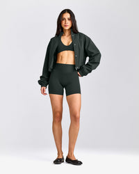 SoftMotion™ Minimal Halter Neck Bralette with Gray Logo | Emerald Noir