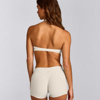SoftMotion™ Minimal Halter Neck Bralette with Grey Logo | Marshmallow White