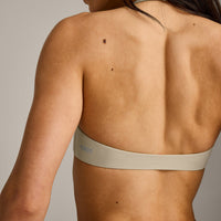 SoftMotion™ Minimal Halter Neck Bralette with Grey Logo | Oatmeal