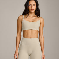 SoftMotion™ Strappy Sports Bra with Grey Logo | Oatmeal