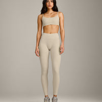 SoftMotion™ Strappy Sports Bra with Grey Logo | Oatmeal