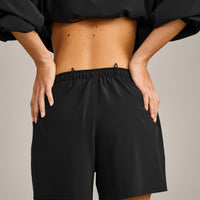 AirMove™ Lined Shorts 4" with Pocket and Reflective Logo | Black
