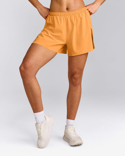 AirMove™ Lined Shorts 4" with Pocket and Reflective Logo | Powdered Orange