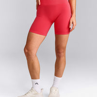EffortlessLift™ Seamless Mid Rise Shorts with Grey Logo | Charged Pink
