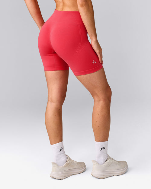 EffortlessLift™ Seamless Mid Rise Shorts with Gray Logo | Charged Pink
