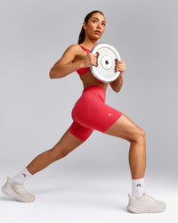 EffortlessLift™ Seamless Mid Rise Shorts with Grey Logo | Charged Pink