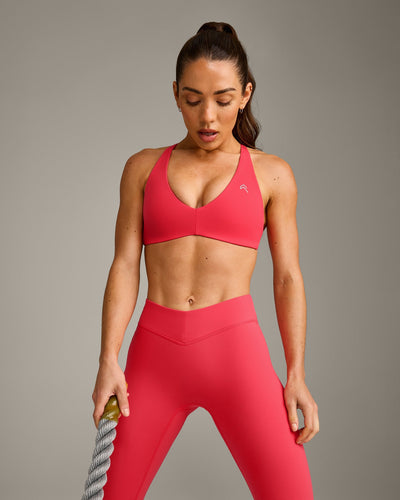 UnifiedMove™ Cross Back Sports Bra with Reflective Logo | Charged Pink