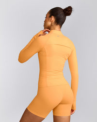 UnifiedMove™ Jacket with Reflective Logo | Powdered Orange