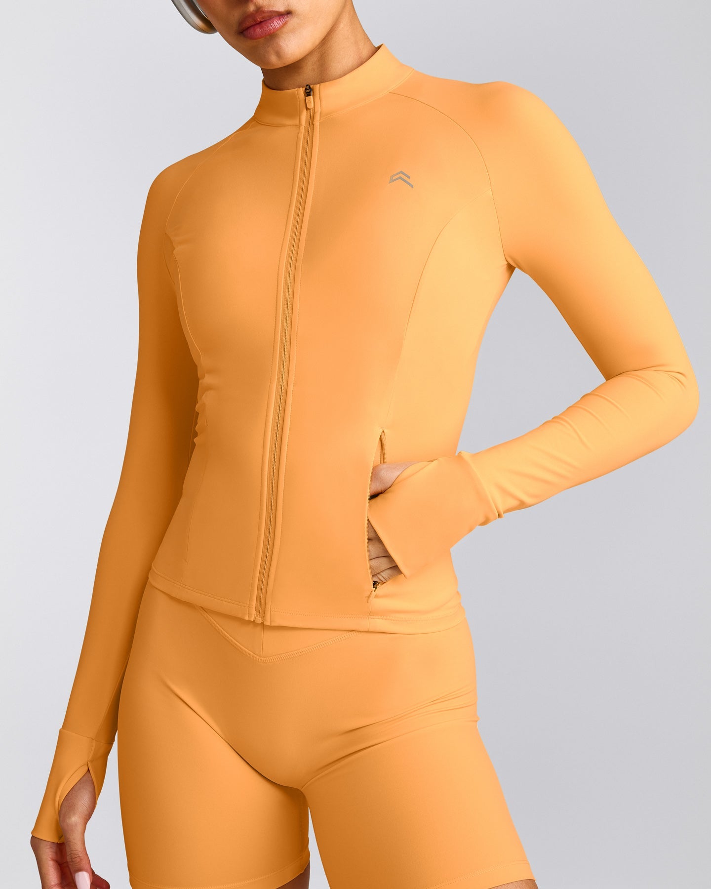 UnifiedMove™ Jacket with Reflective Logo | Powdered Orange