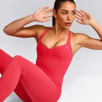 UnifiedMove™ T Back Mid Tank Top with Built in Bra Shelf with Reflective Logo | Charged Pink