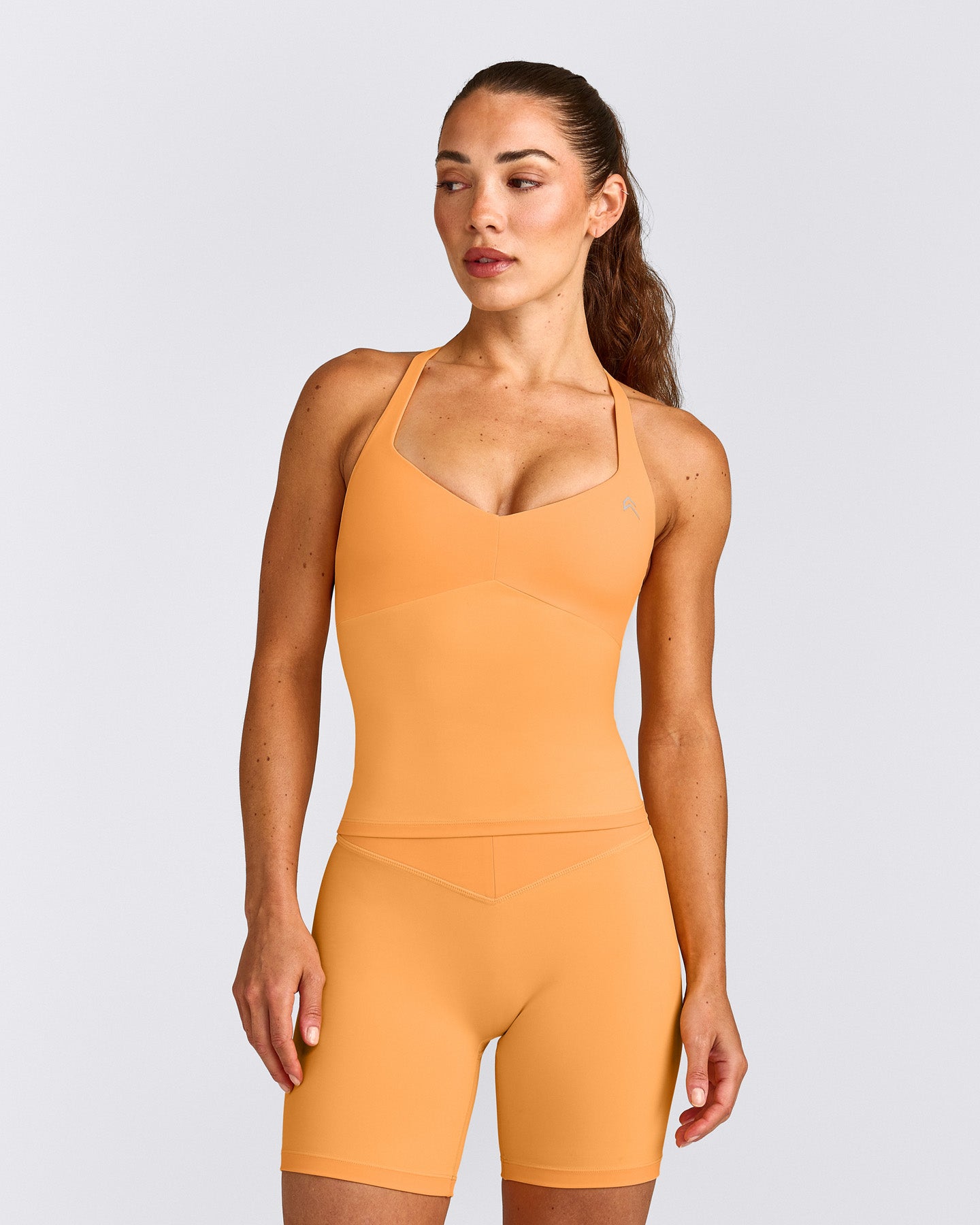 UnifiedMove™ T Back Mid Vest with Built in Bra Shelf with Reflective Logo | Powdered Orange