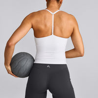 UnifiedMove™ T Back Mid Vest with Built in Bra Shelf with Reflective Logo | White
