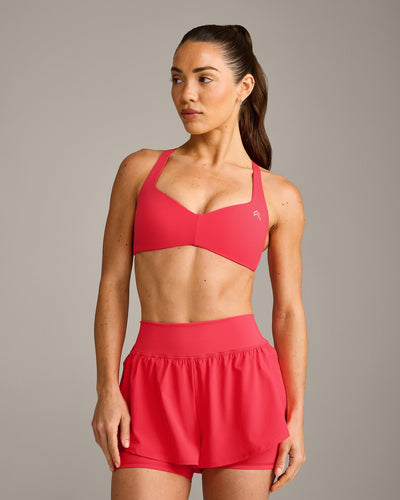 UnifiedMove™ T Back Minimal Bralette with Reflective Logo | Charged Pink