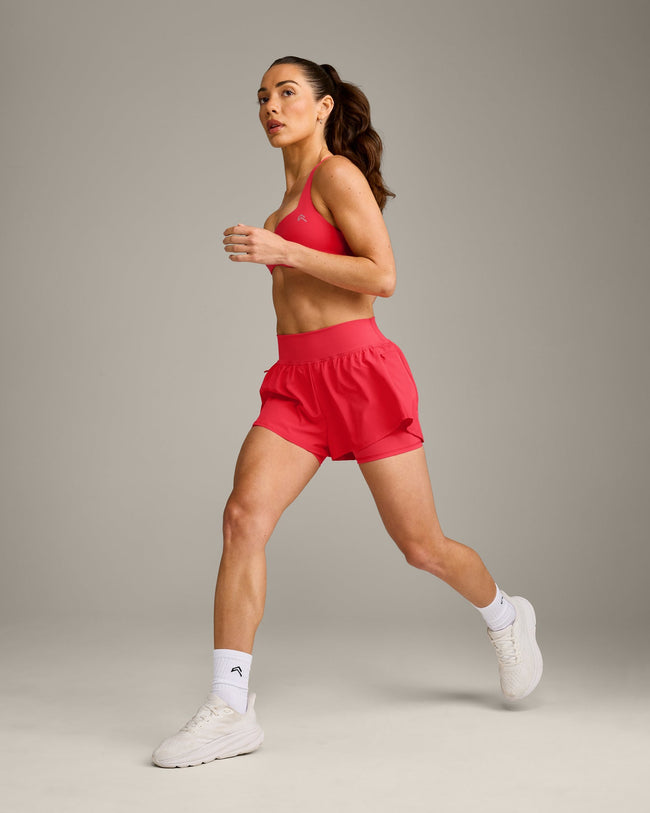 UnifiedMove™ T Back Minimal Bralette with Reflective Logo | Charged Pink
