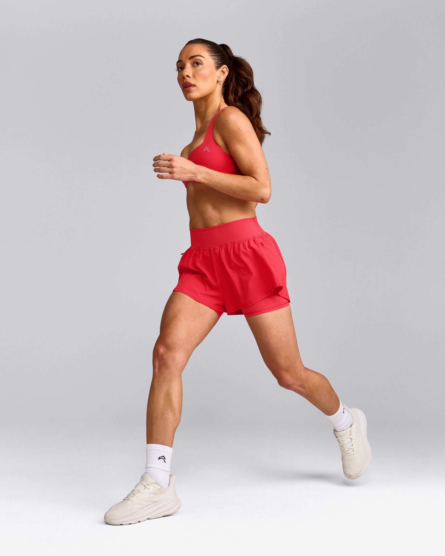 UnifiedMove™ T Back Minimal Bralette with Reflective Logo | Charged Pink