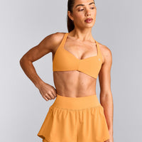 UnifiedMove™ T Back Minimal Bralette with Reflective Logo | Powdered Orange