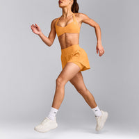 UnifiedMove™ T Back Minimal Bralette with Reflective Logo | Powdered Orange