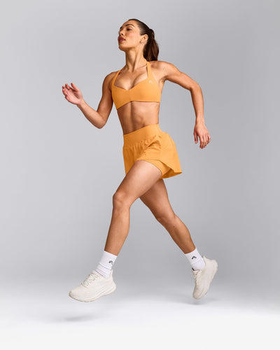 UnifiedMove™ T Back Minimal Bralette with Reflective Logo | Powdered Orange
