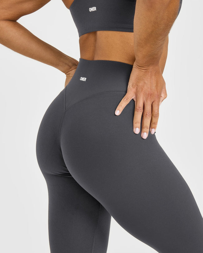 SoftMotion™ High Waisted Leggings with White Logo | Coal