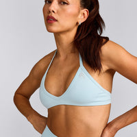 EnhanceLift™ Seamless Minimal Halter Neck Bralette with Grey Logo | Cloud Blue