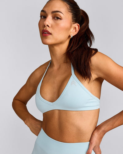 EnhanceLift™ Seamless Minimal Halter Neck Bralette with Grey Logo | Cloud Blue