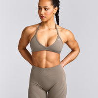 EnhanceLift™ Seamless Minimal Halter Neck Bralette with Grey Logo | Warm Minky