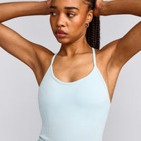 EnhanceLift™ Seamless Strappy Racer Vest with Built in Bra Shelf with Grey Logo | Cloud Blue