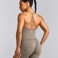 EnhanceLift™ Seamless Strappy Racer Vest with Built in Bra Shelf with Grey Logo | Warm Minky