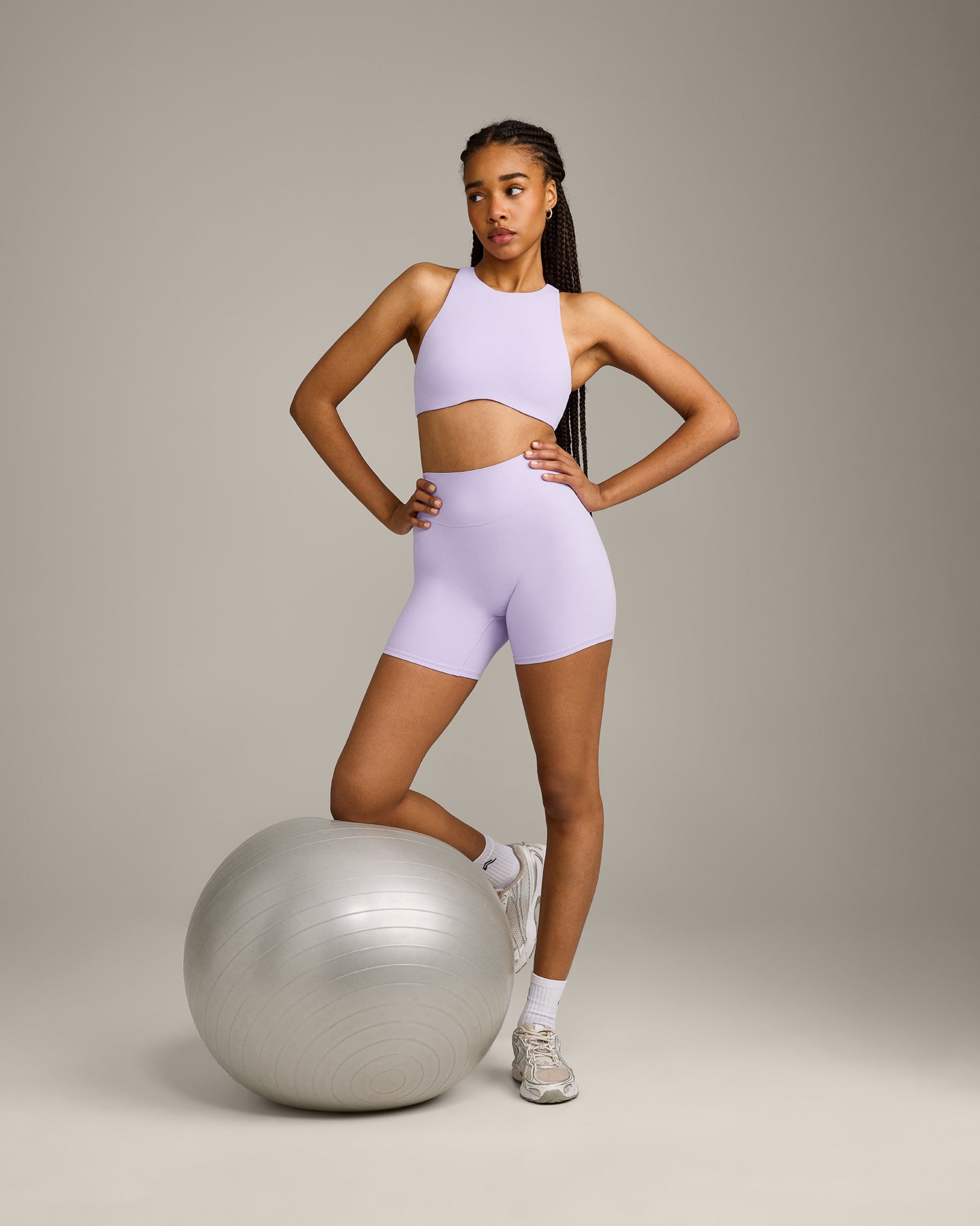 SoftMotion™ High Neck Sports Bra with Grey Logo | Lavender Purple