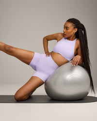 SoftMotion™ High Neck Sports Bra with Grey Logo | Lavender Purple