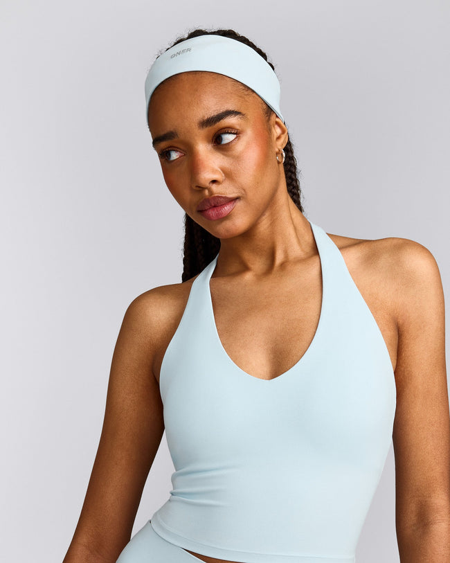 SoftMotion™ Halter Neck Mid Vest with Built in Bra Shelf with Grey Logo | Cloud Blue