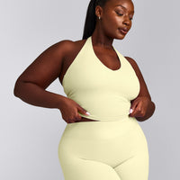SoftMotion™ Halter Neck Mid Vest with Built in Bra Shelf with Grey Logo | Pastel Yellow