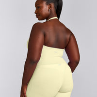 SoftMotion™ Halter Neck Mid Vest with Built in Bra Shelf with Grey Logo | Pastel Yellow