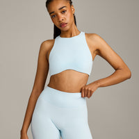 SoftMotion™ High Neck Sports Bra with Grey Logo |  Cloud Blue