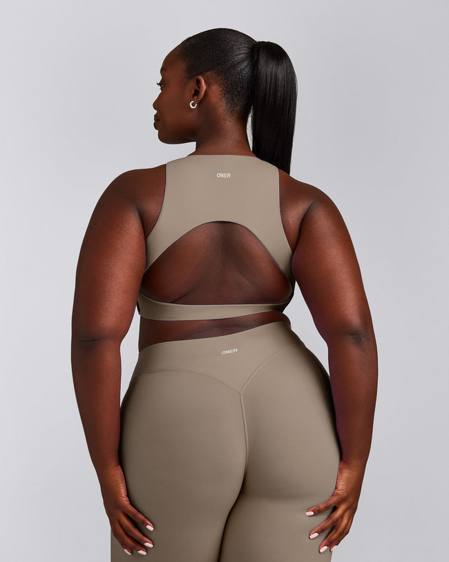 SoftMotion™ High Neck Sports Bra with Gray Logo | Minky