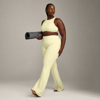 SoftMotion™ High Neck Sports Bra with Grey Logo | Pastel Yellow
