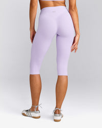 SoftMotion™ High Waisted Capri Leggings with Grey Logo | Lavender Purple